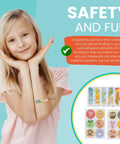 Front view of a smiling child wearing a teal PreparaKit Travel First Aid Kit for Kids; corner shows kit contents and sticker sheets.