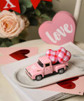 Valentine's Day Metal Farm Truck Decor With Two Hearts on tray, mini pink diecast pickup model in rustic farmhouse charm setting.