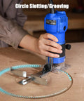 User operating 630W Compact Wood Router With Fixed Base And Beast Mode 35000 Rpm Motor for circle slotting on wood.