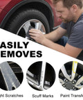 Man using Top Shelf Gloss Silver Wheel Scratch Repair Kit on alloy rim to remove light scratches and scuff marks.
