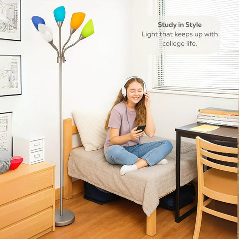 Medusa Adjustable Floor Lamp for Bedroom With Five Multi Colored Acrylic Shades Gooseneck Standing Reading Lamp Modern Metal Floor Light in Silver Finish next to a bed and desk in a dorm room.
