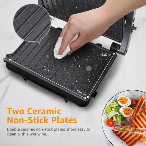 Aigostar Silver 1000W Panini Press Grill With Ceramic Nonstick Plates For Even Cooking Bacon Burgers Chicken Steaks And Reheating Personal Pizza showing easy clean ceramic plates.