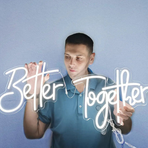 Man holding "Better Together" LED sign, part of Custom Mr And Mrs Neon Sign For Wedding And Engagement LED Lights Lighted Display