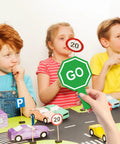 Children using Stop And Go Traffic Sign With Handle For Kids Double Sided Red Light Green Light Crossing Guard Sign Waterproof PVC