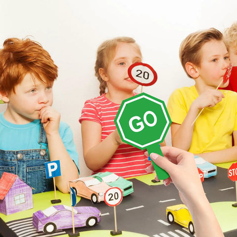 Children using Stop And Go Traffic Sign With Handle For Kids Double Sided Red Light Green Light Crossing Guard Sign Waterproof PVC