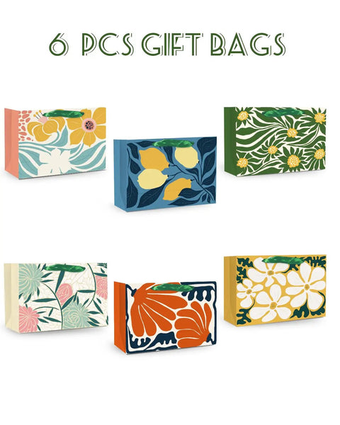 Set of 6 Clash Flowers Gift Bags with Tissue Paper Handles Pack Of 6 Medium Size Recyclable Cardboard Gift Bags For Parties And Gifts Bold Floral Design Eco Friendly Wrapping Supplies Perfect For Presents, featuring vivid floral prints.