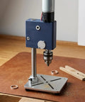 Heavy Duty Mini Drill Press Compact Desktop Power Tool For Garage And Small Factory Stable Base Workbench Machine For Precision Hole Drilling Portable Setup on leather surface.
