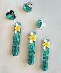 Coastal Cabinet Pulls Set Of Four 3-3/4 Inch Center To Center Drawer Handles with ocean-themed floral artwork on white and black bases