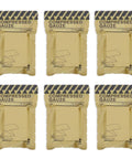 Six beige sterile compressed gauze packets for first aid