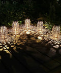 Two Pack Solar Lantern Lights For Hanging Or Table Outdoor Patio Garden Silver Finish Solar Powered Lights with patterned glow on deck