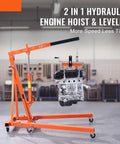 Hella Sturdy Hydraulic Engine Hoist With Smooth Action Lever 2 Ton 4400 Lbs Folding Crane lifting engine in garage.