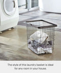 Modern Steel Laundry Basket With Water Resistant Finish, Slick 8.75 Gallon Capacity in use in a laundry room.