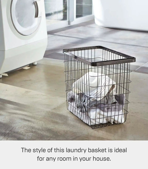 Modern Steel Laundry Basket With Water Resistant Finish, Slick 8.75 Gallon Capacity in use in a laundry room.