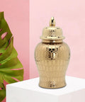 Hassle Free Ceramic Pantry Canisters For Tea Coffee Sugar Spices Totally Sealed Kitchen Storage Jars With Secure Lids in gold with decorative pattern.