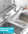 Top Tier Kitchen Sink Faucet Featuring A Smooth Pull Down Sprayer Integrated Soap Dispenser And Heavy Duty Brushed Finish For Quick Daily Tasks And No Fuss Cleanups in action, showcasing strong water pressure.