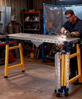Built Like A Tank Portable Welding Table With Adjustable Height Workbench Supporting Up To 1200 Lbs Features rust resistant galvanized surface in workshop.