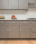 Gray kitchen cabinets with 25 Pack Solid 5 Inch Square Kitchen Cabinet Handles in Brushed Nickel Pulls for Cabinets and Drawers installed.