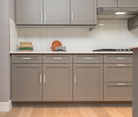 Gray kitchen cabinets with 25 Pack Solid 5 Inch Square Kitchen Cabinet Handles in Brushed Nickel Pulls for Cabinets and Drawers installed.