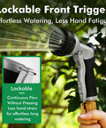 Person using Tough As Nails Heavy Duty Metal Garden Hose Nozzle With Seven Adjustable Spray Patterns High Pressure Hand Sprayer with lockable trigger in garden.