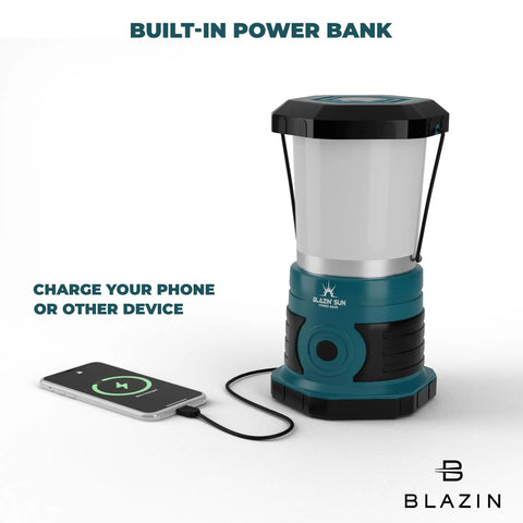 Beast 1500 Lumen Rechargeable LED Lantern With 12000mAh Power Bank, 360 Degree COB Lighting For Blackouts, Storms, And Emergencies, 85 Hour Runtime Teal, showing phone charging feature.