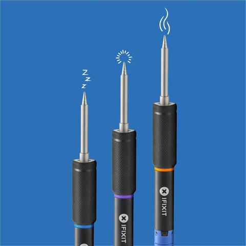 Close-up of FixHub Portable Soldering Station With Quick Heat Up And Two Smart Ports, showing three metal tips.
