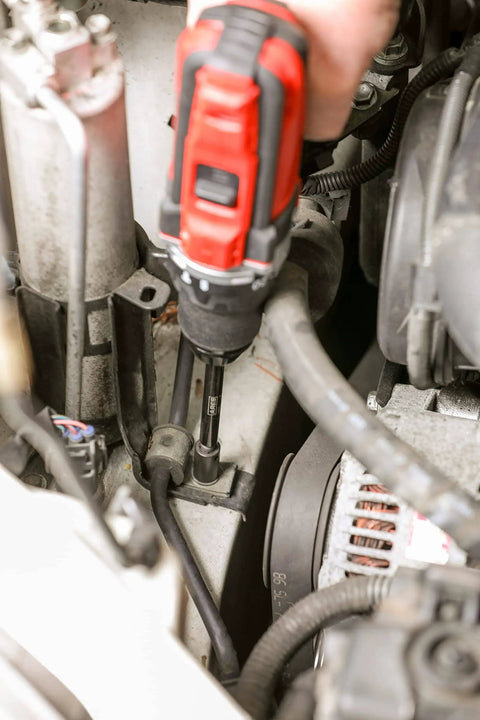 Using Three Piece Magnetic Bit Holder Set With Quarter Inch Hex Shank For Power Drills And Drivers Includes Two And A Half Inch Four Inch And Six Inch Extensions For Secure Bit Retention And Workhorse Reliability in tight engine space.