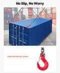VEVOR four-leg chain sling with red safety-latch hooks lifting a blue shipping container (front view).