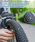 Close-up of Two Pack 26 Inch Self Sealing Bike Tubes With 32mm Schrader Valve Puncture Resistant Inner Tubes on bike wheel.