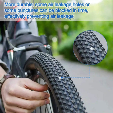 Close-up of Two Pack 26 Inch Self Sealing Bike Tubes With 32mm Schrader Valve Puncture Resistant Inner Tubes on bike wheel.