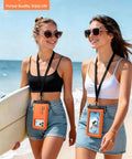 Two women on beach with Floating Waterproof Phone Pouch 2 Pack IP68 Case For Beach Adventures And Water Sports Dry Bag.