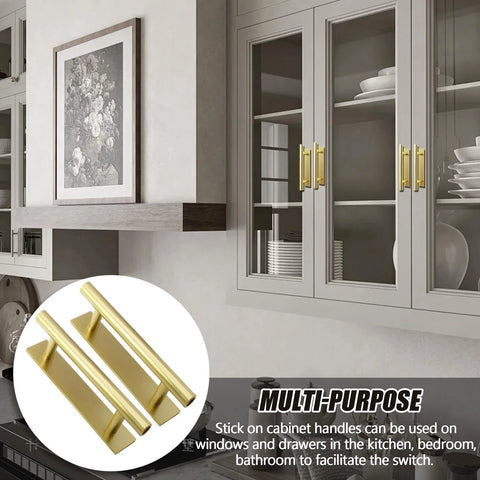 Gold ABS self-adhesive handles on glass cabinets in kitchen, 10 Pack Self Adhering Push Pull Handles ABS Plastic For Wardrobe Cabinets Drawers Instantly Improve Access With No Drilling Leaves No Traces On Smooth Surfaces Gold Finish Durable Easy To Install.