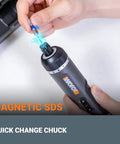 Hand holding 4V Lithium Cordless Screwdriver Kit with 30 Piece Accessory Pack, showing magnetic SDS and quick change chuck feature.