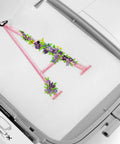 Letter A embroidered with flowers on PE900 Embroidery Machine With 5 x 7 Inch Field Size, Wireless WLAN, Jump Stitch Cutter