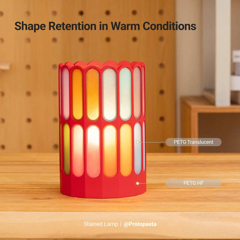 Stained lamp made with Top Shelf PETG Translucent Filament For 3D Printers 1.75 Mm Diameter 1Kg Spool on wooden surface.