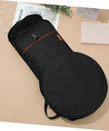 Road Ready Portable Dumb Drum Bag For Silent Practice Pad Storage In Slick Oxford Fabric. Padded, waterproof, and black carry case.