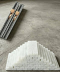 Stacked soapstone blocks and rulers for Industrial Marking Pencil And Soapstone Marker For Metal Fabrication, Heat Resistant Chalk Pro Grade.