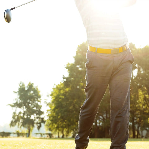 Golfer wearing Shiny Edition Genuine Leather Golf Belt Set With No Hole Ratchet Track Micro Adjust Belts For Men