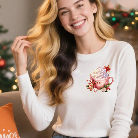 Model wearing white shirt with festive dessert cup design, part of 12 Piece Dessert Cup Iron On Transfer Kit For Christmas Festive Dessert Cup Designs DIY Heat Transfer Stickers For T Shirts Washable Iron On Decals DTF Transfers Ready To Press For Holiday Party Clothing Caps.