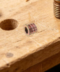 M6x10mm Wood Threaded Inserts With Countersunk Flange for Furniture Carbon Steel on wood surface