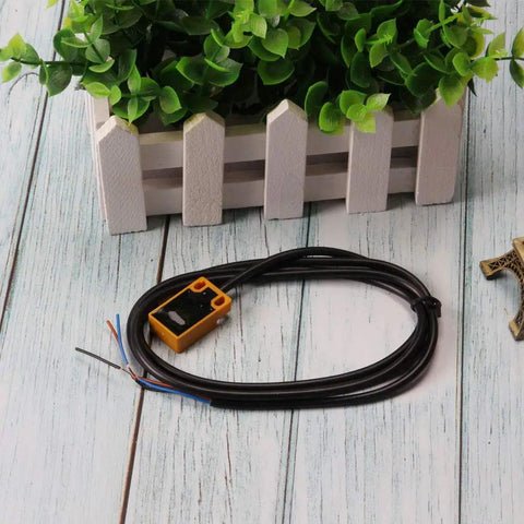 3 Pack TL W5MC1 5mm Inductive Proximity Sensor 3 Wire NPN DC 6-36V Detection Switch with long cable on wooden surface