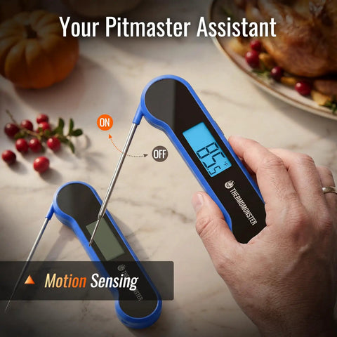 Hand holding Blue 0.5 Second Instant Read Digital Meat Thermometer With 0.5 Degree Fahrenheit Precision for BBQ use