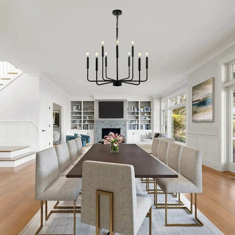Black Farmhouse Chandelier For Dining Room Over Table Nine Light Industrial Metal Candle Lighting Fixture For Living Room Kitchen Island Entryway Foyer With Modern Rustic Vibe illuminating dining area with nine candle-style lights.