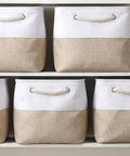 Heavy Duty Foldable Linen Storage Cubes 6 Pack Rock Solid Organizational Baskets with Nifty Rope Handles on shelves.