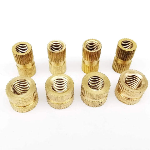Premium Solid Brass Metric Thread Inserts In M2 Through M8 Sizes for repairing wood and plastic projects, showing eight inserts.