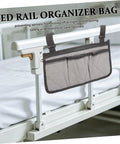 Bed Rail Organizer With Four Pockets And Cup Holder, Hanging Bedside Storage Caddy in gray fabric for caregivers and hospital use