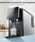 Smooth Operator Countertop Nugget Ice Maker With Snap Pour Auto Dispenser 33 Lbs dispensing chewable ice into glass.