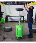 18 Gallon Spillproof Portable Oil Drain Pan With Rolling Cart And Steel Waste Oil Container For Easy Oil Changes in use