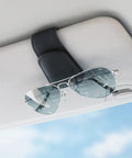 Heavy Duty Magnetic Sunglass Holder For Car Sun Visor With Secure Snap Clip And Soft Leather Wrap One Handed Eyewear Organizer on visor with sunglasses.