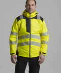 Man wearing Hi Vis Winter Work Jacket With Reflective Waterproof Shell And Thermal Quilted Lining ANSI 3 Safety Coat X Large
