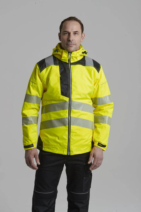 Man wearing Hi Vis Winter Work Jacket With Reflective Waterproof Shell And Thermal Quilted Lining ANSI 3 Safety Coat X Large